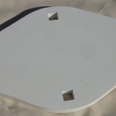 Between the bracket transom plate and the hull there is a UV resistant EPDM90 rubber block.  The item shown is for a flat transom so both faces are parallel.  The survey records the curvature of the hull at the chosen mounting position so the block supplied has a curved underside to match the yacht hull surface.