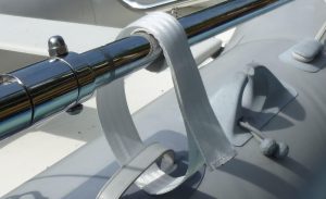 Velcro harness securing Transverse Link to the dinghy handle. Dinghy Derrick Velcro harness